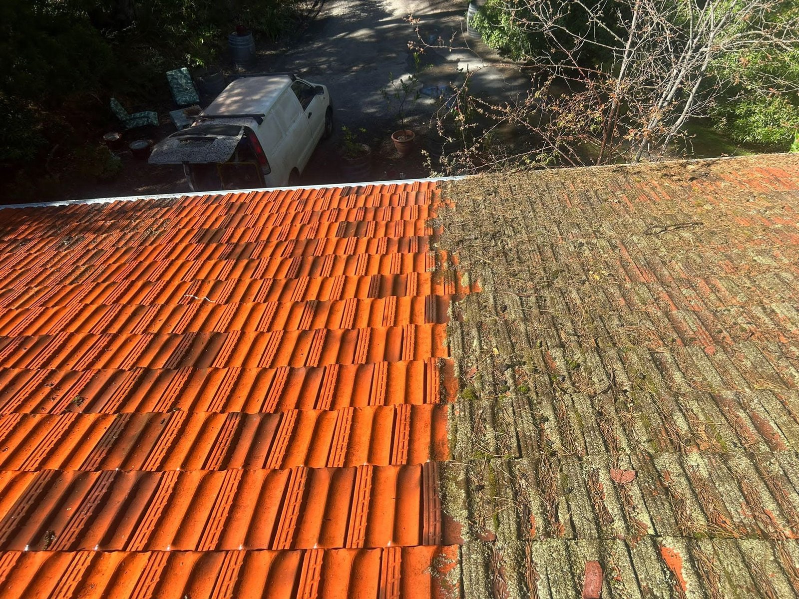 terracotta-roof-restoration-before-and-after-pressure-cleaning-1.jpg